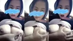 Gadis Berhijab Cantik Meremas Payudara Besar