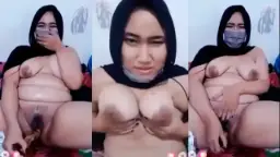 Tante Montok Berjilbab Hitam Mengocok Kontol Gede