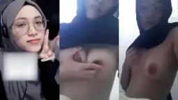 Ukhti Berkacamata Sengaja Pamer Belahan Dada